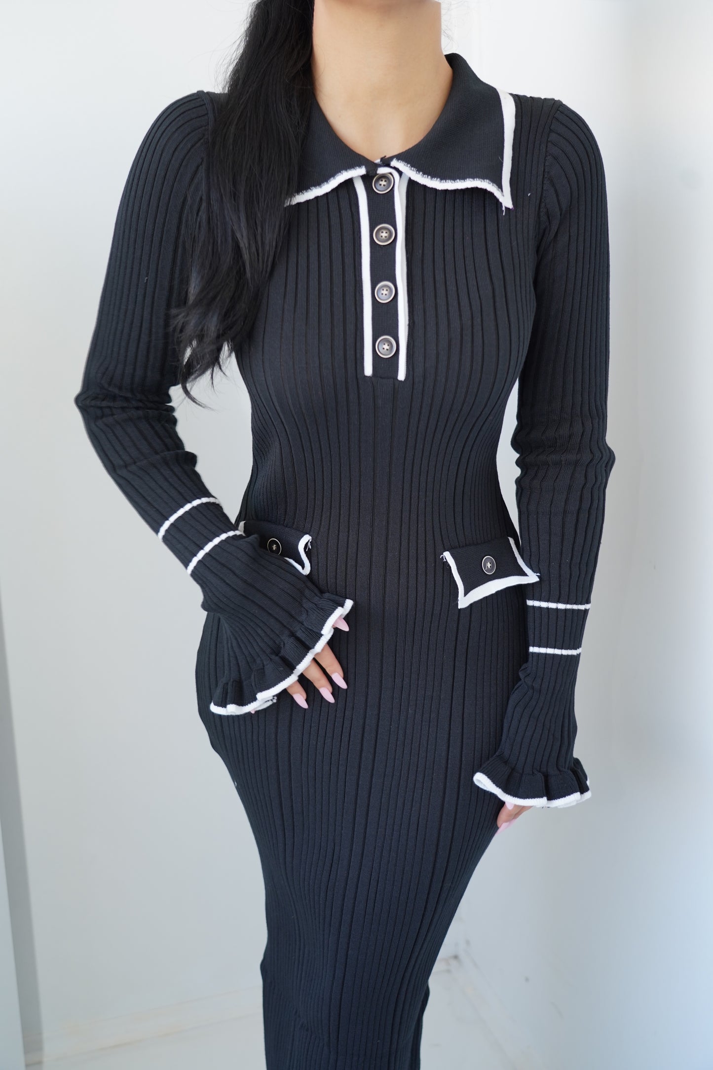 This ribbed knit black maxi dress is the definition of classy chic.