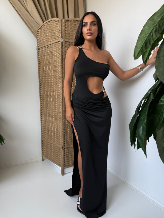 Classic black, bold cut-outs, and metallic details