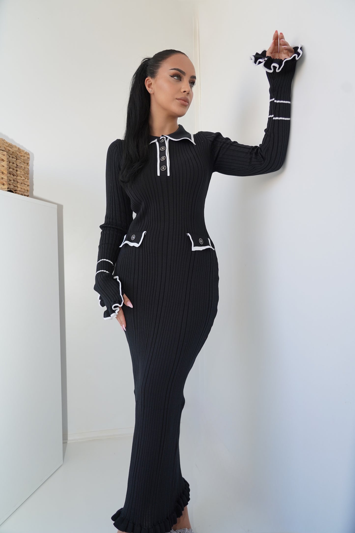 This ribbed knit black maxi dress is the definition of classy chic.