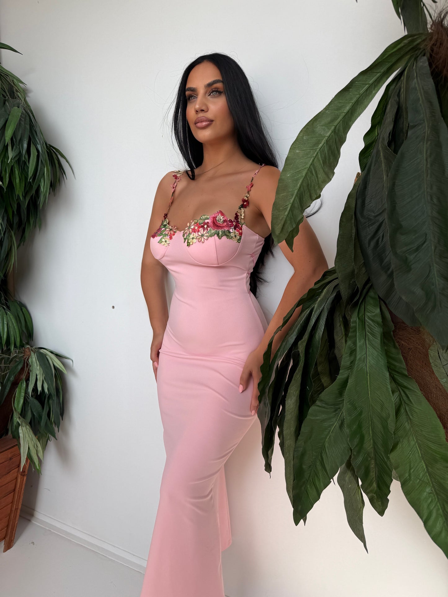 Romantic pastel pink dress with elegant embroidered floral details