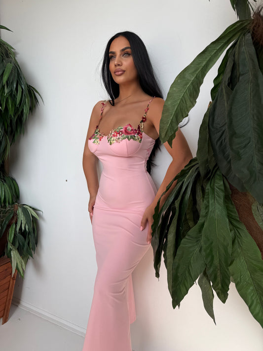 Romantic pastel pink dress with elegant embroidered floral details