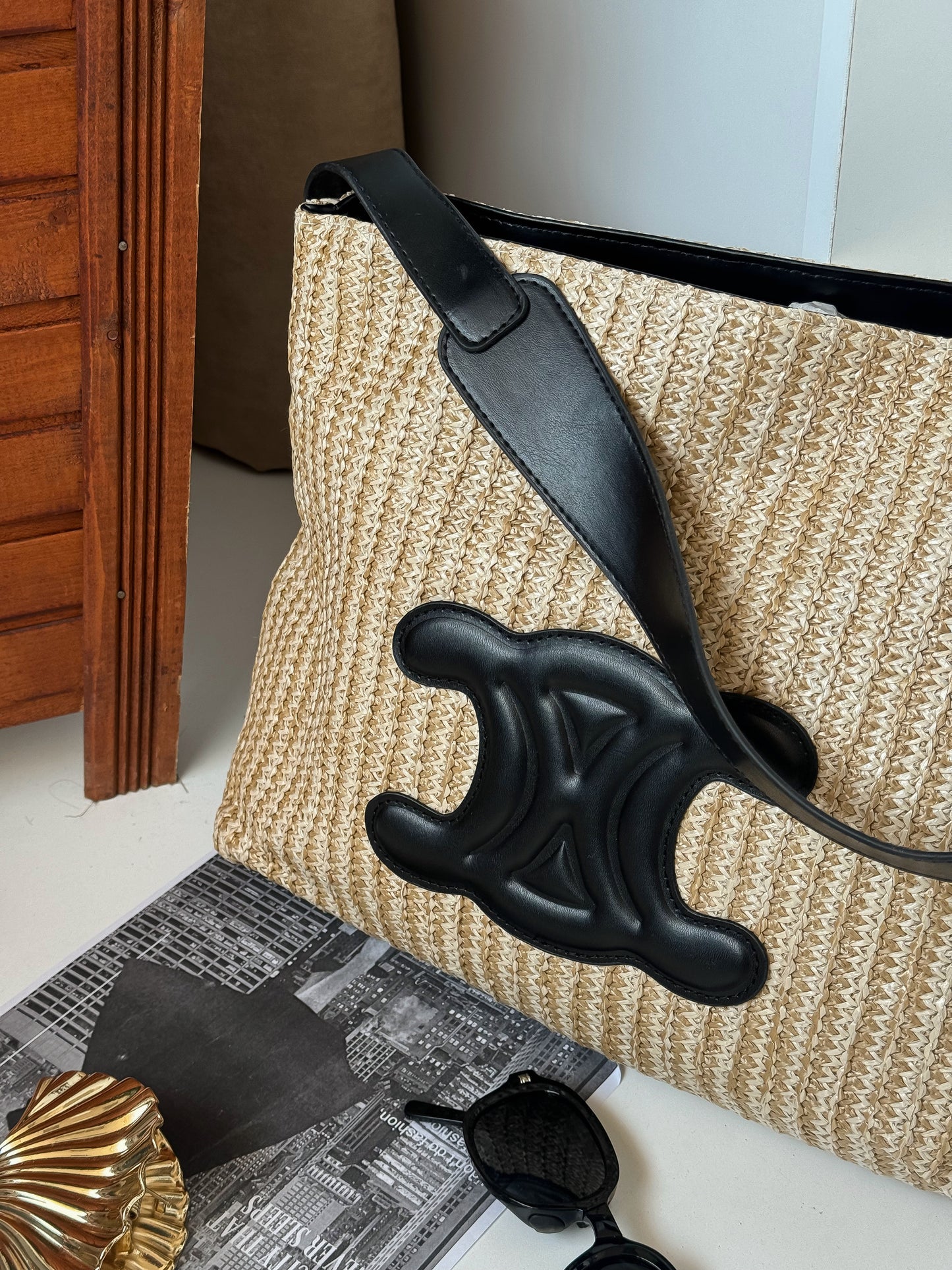 Elegant Woven Straw Shoulder Bag with Black Leather Accent