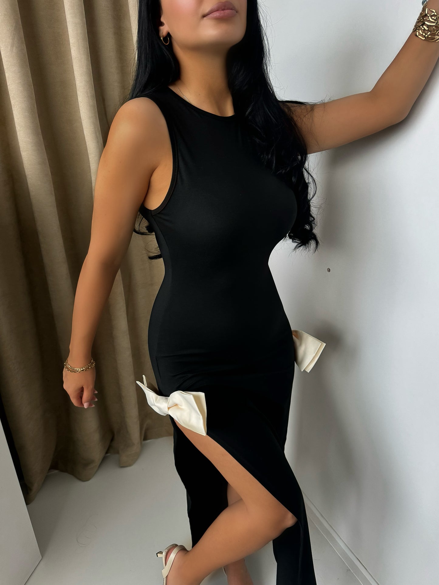 Elegant Black Maxi Dress with Side Slit and Bow Details