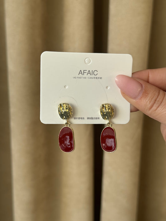 Touch of gold. Hint of red.