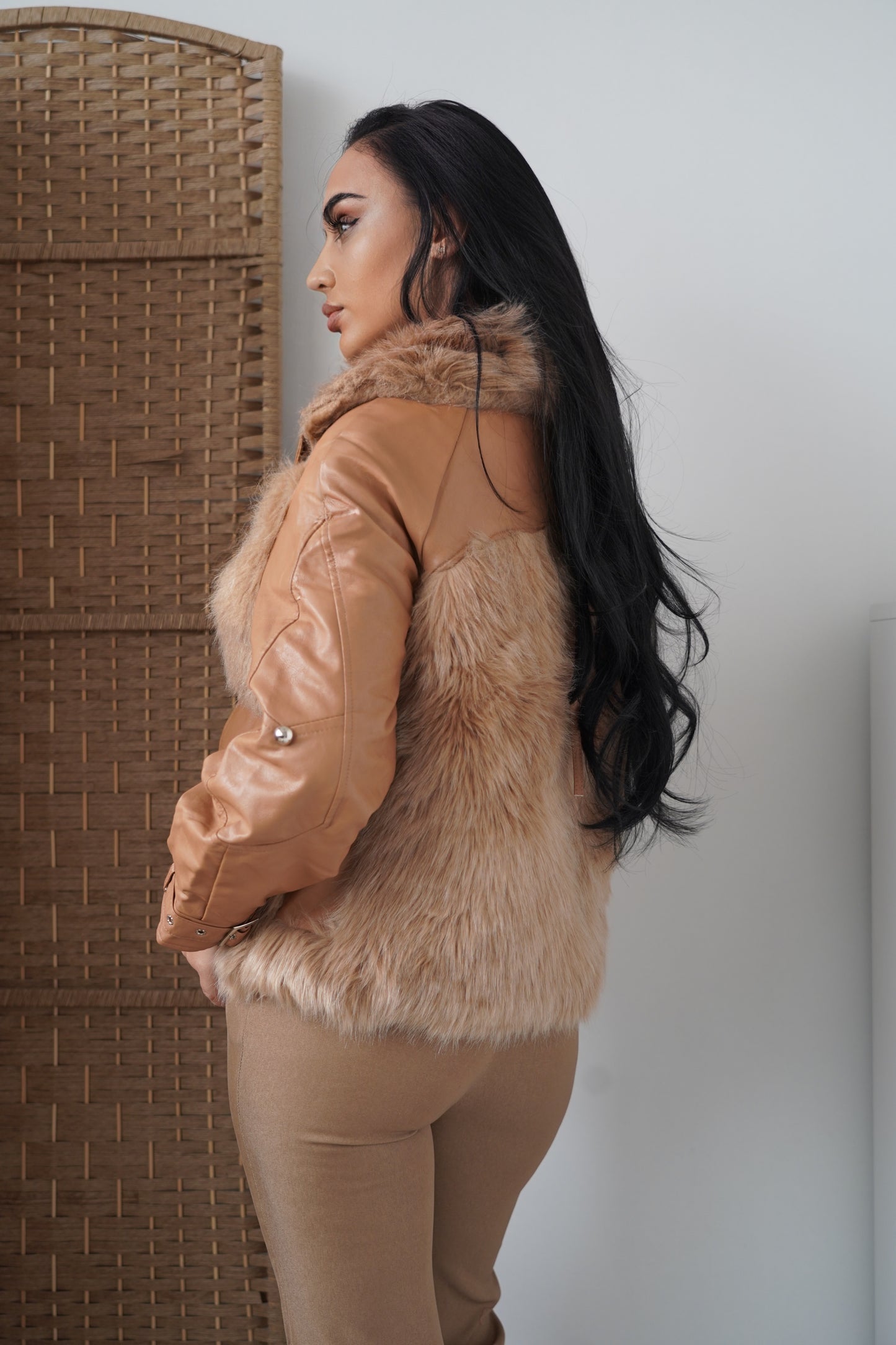 Statement caramel jacket featuring a unique mix of faux leather and soft fur.
