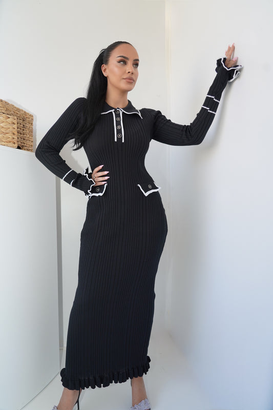 This ribbed knit black maxi dress is the definition of classy chic.