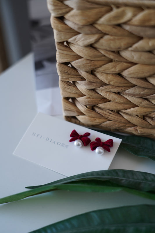 Elegant velvet earrings in deep red
