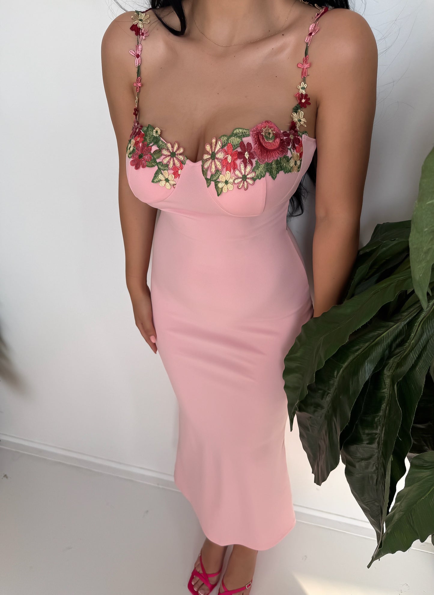 Romantic pastel pink dress with elegant embroidered floral details