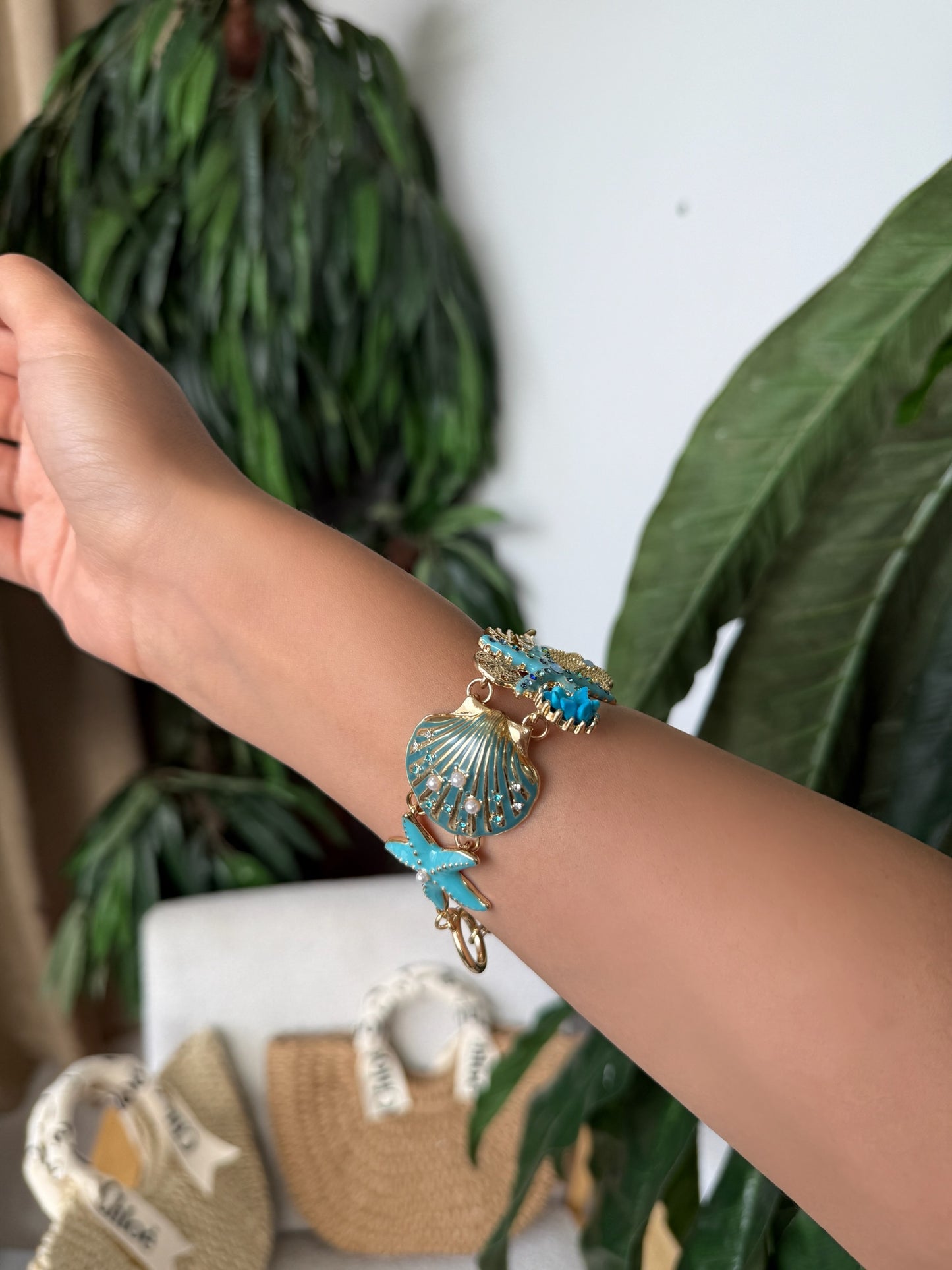 Ocean-Inspired Charm Bracelet – Gold & Turquoise Details