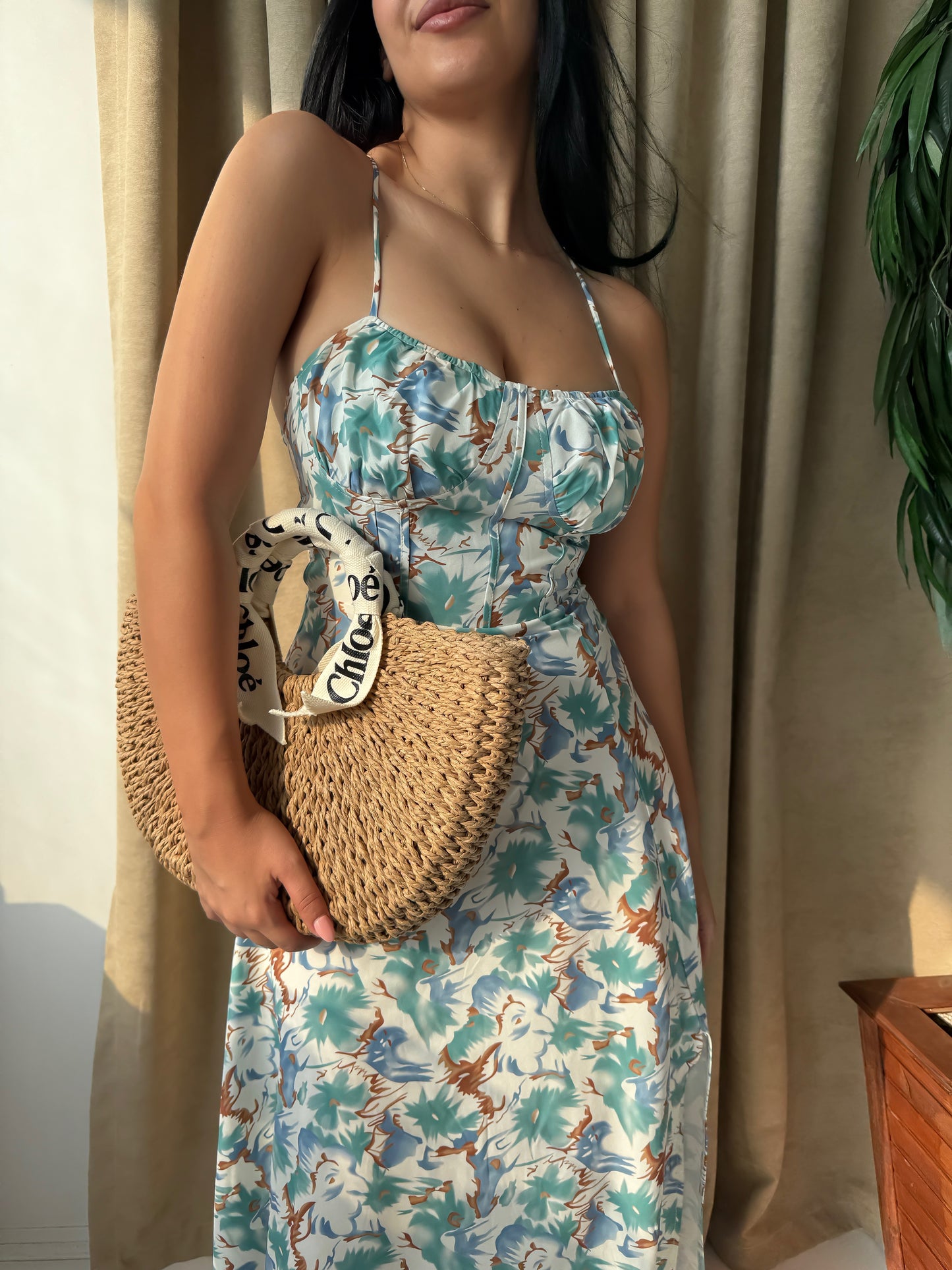 Step into summer with elegance and ease in this stunning tropical print maxi dress.