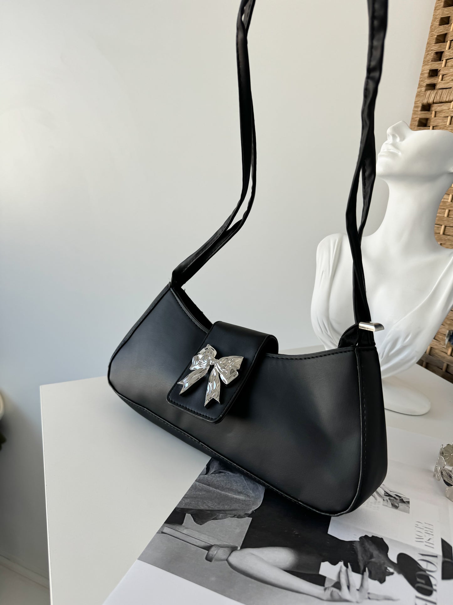 Black Shoulder Bag with Silver Bow Accent