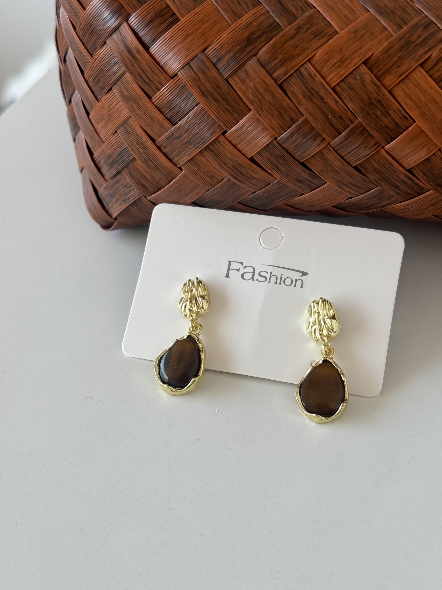 Gold Drop Earrings with Dark Gemstone Accent