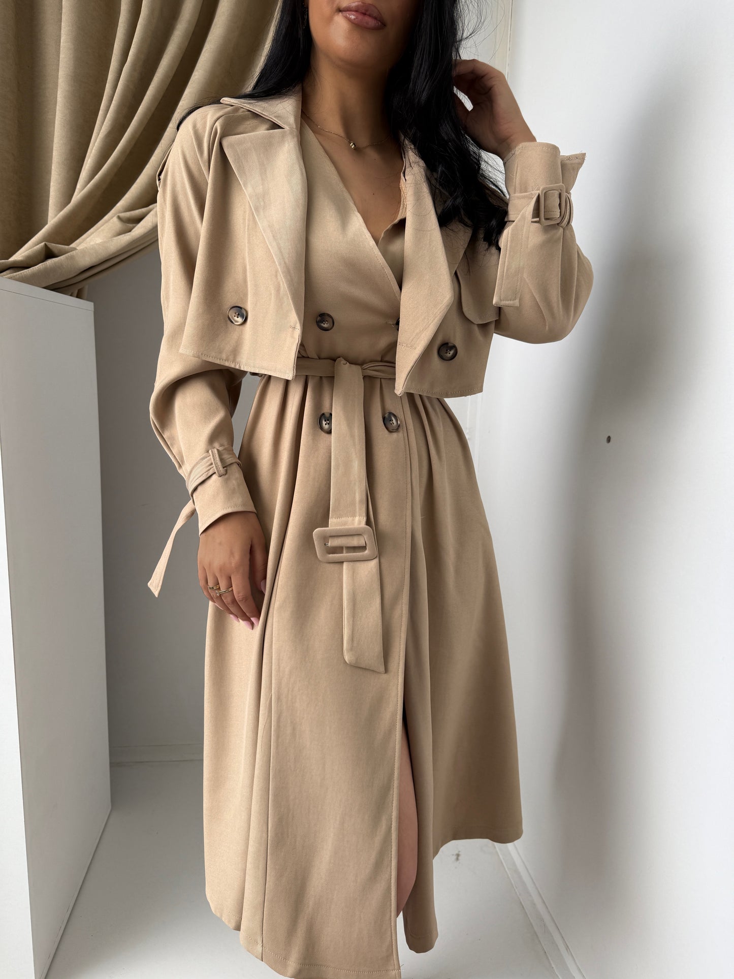 Two-piece set featuring a stylish dress and matching trench-style jacket.