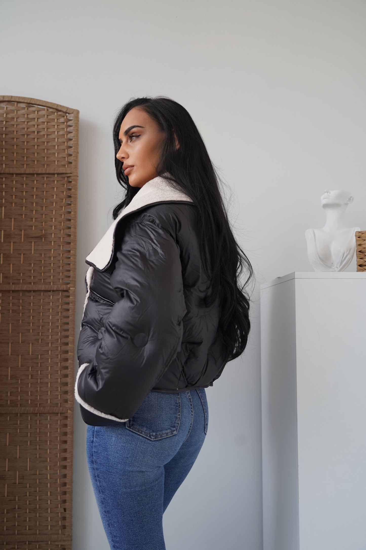 Cropped jacket crafted in leather-look fabric, lined with soft faux shearling for maximum warmth.